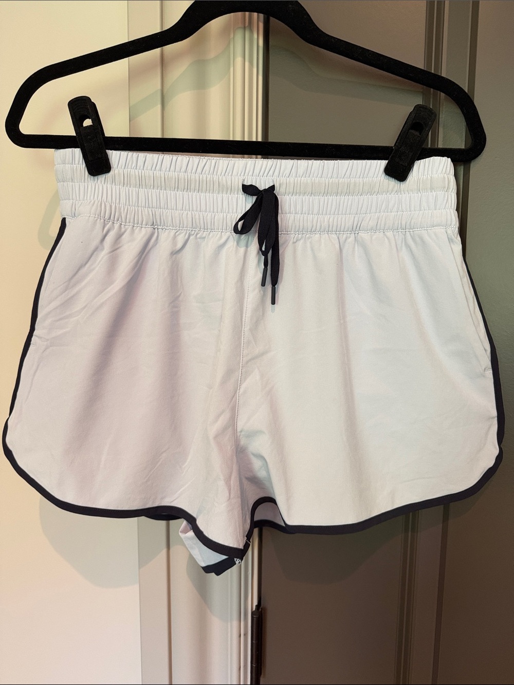 Women's very light blue Athletic Shorts with navy  Trim